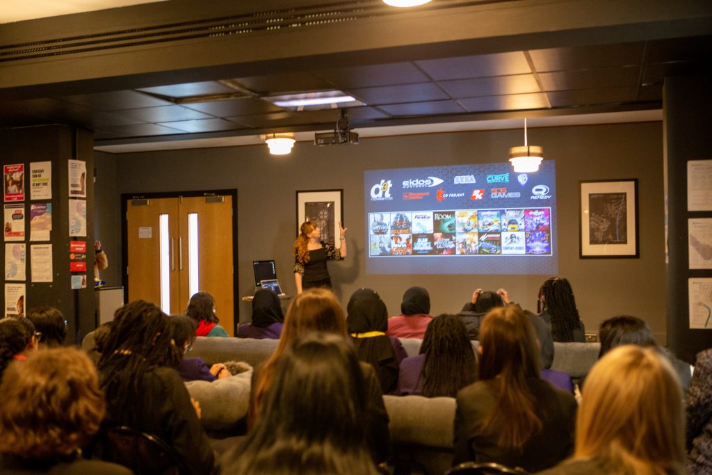 Louise Andrew addresses visiting students at Futureworks' Women in the Creative Industries event for International Women's Day