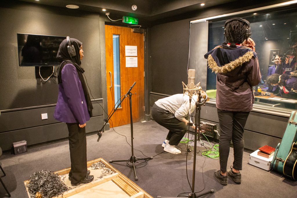 Students in the Foley Studio as part of Futureworks' Sound Design workshop at the Women in the Creative Industries event for International Women's Day